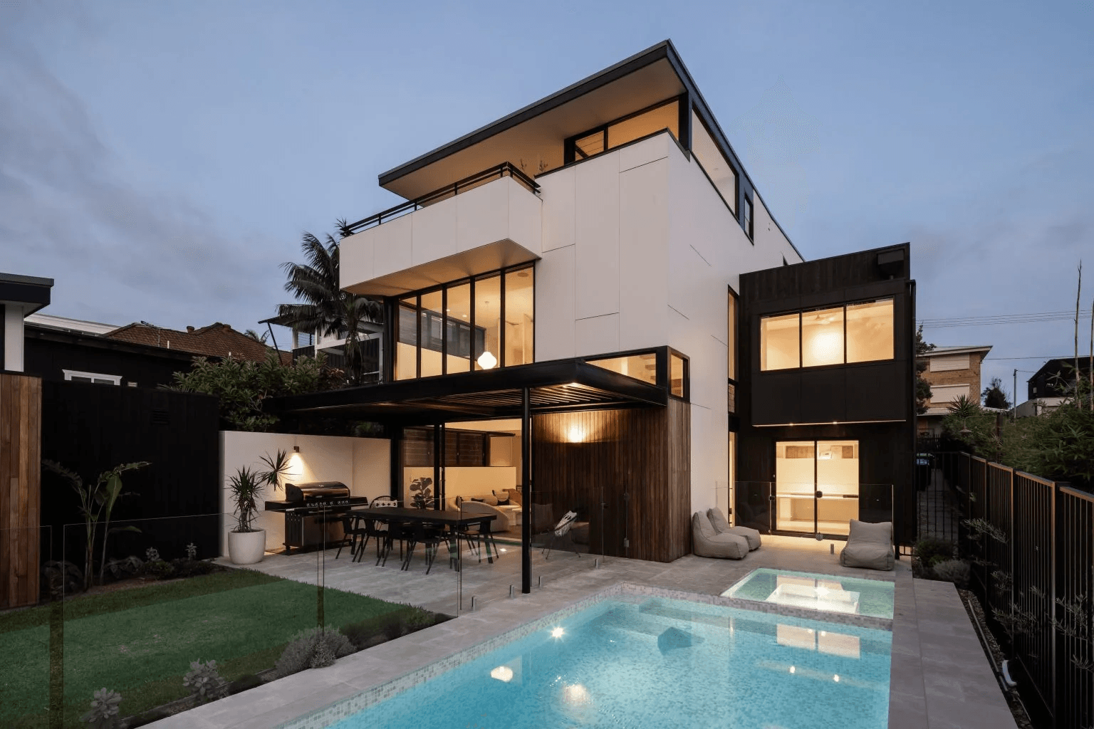 Modern rendered home exterior freshly repainted to handle sun and salt air